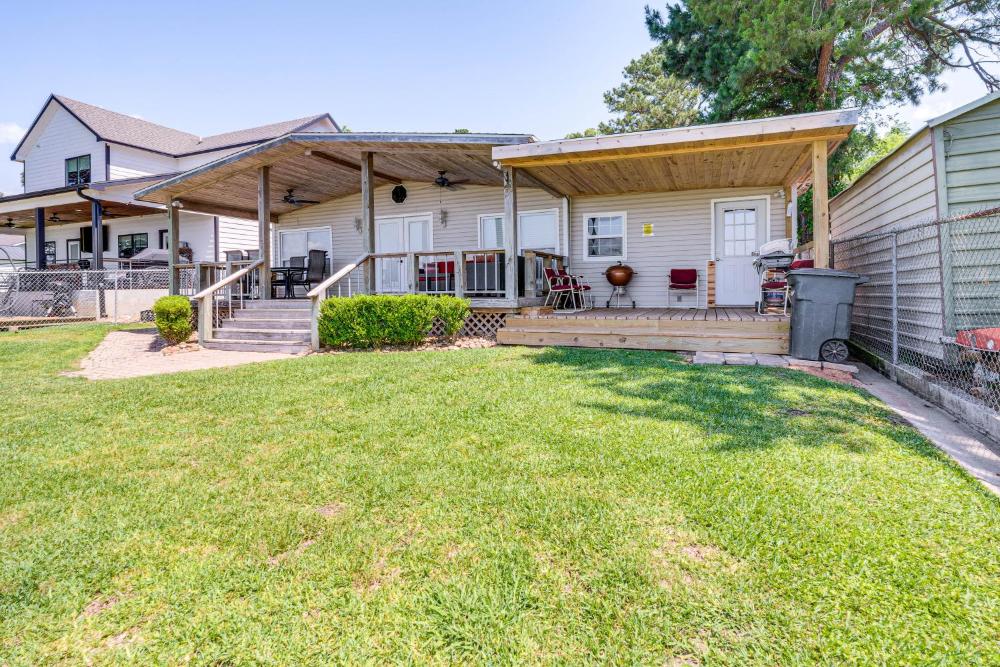 Lakefront Livingston Retreat with Dock and Fire Pit!